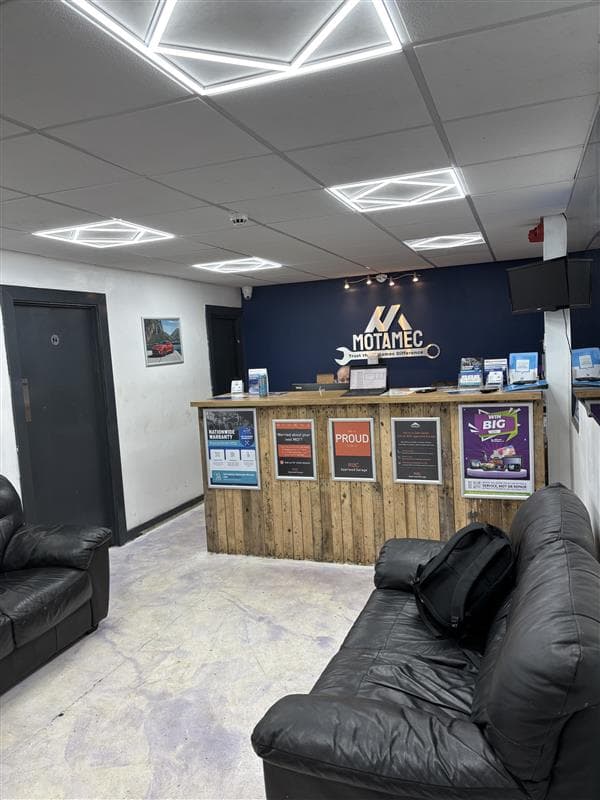 Mechanic working on a car